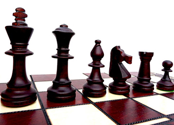Classic pieces on a chessboard - photo of an online store