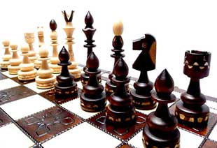 Wooden chess pieces - photo